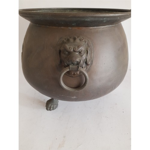 5 - copper planter standing on 3 paw and ball feet. 28cm high