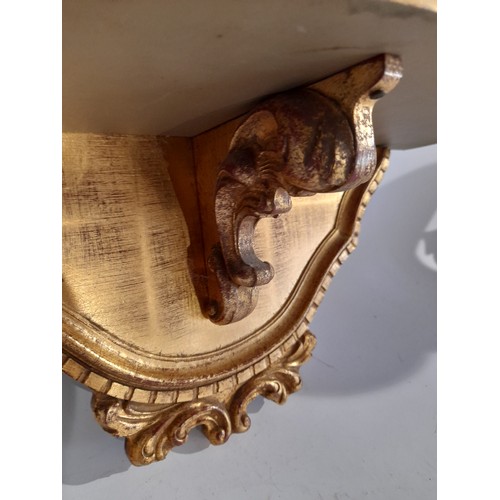 23 - Small gilt painted shelf,43cm wide