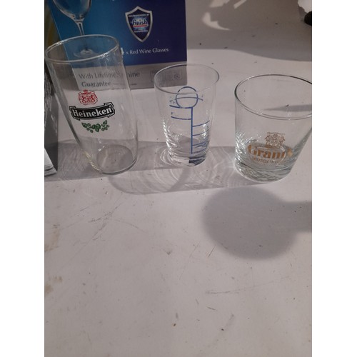 29 - Quantity of boxed glasses some with advertising