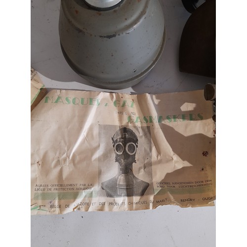 50 - WW2 Gas mask with instructions in canister marked L702 to lid