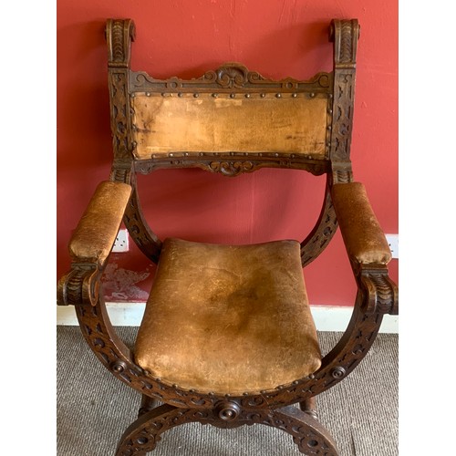 1 - Antique Carved Wood And Leather X Frame Chair.