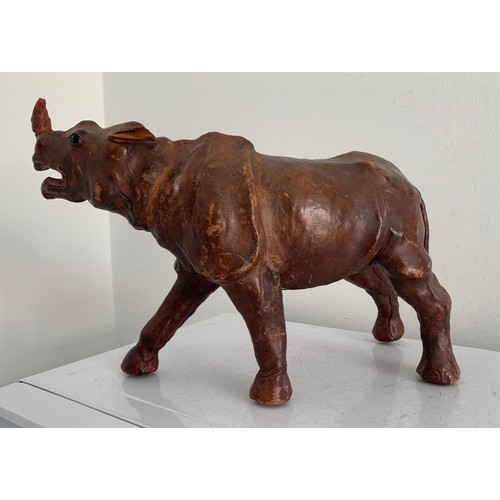 101 - Unusual Large Leather Clad Model Of A Rhinoceros 
34 x 21 cms h