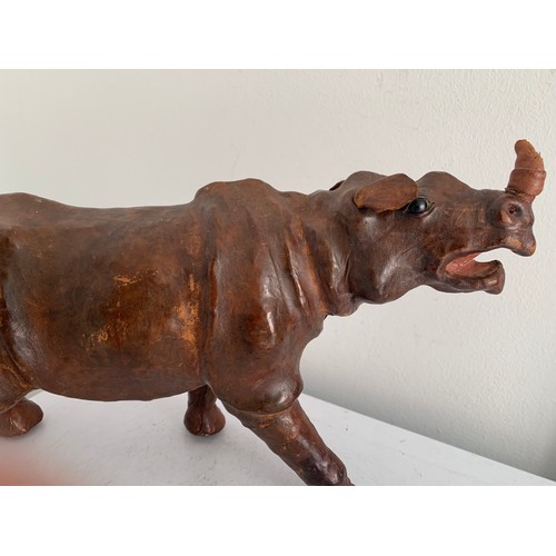 101 - Unusual Large Leather Clad Model Of A Rhinoceros 
34 x 21 cms h