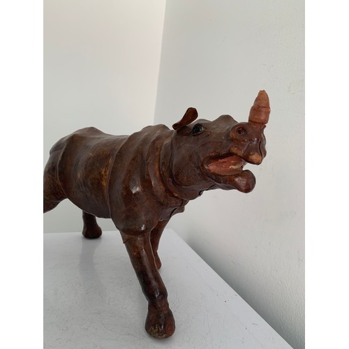 101 - Unusual Large Leather Clad Model Of A Rhinoceros 
34 x 21 cms h