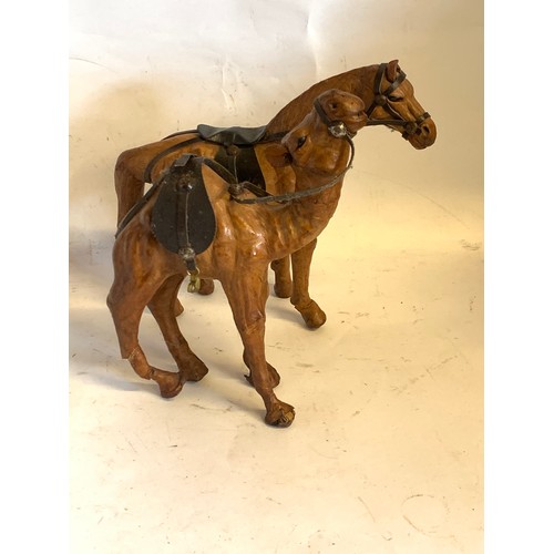 5 - Two Leather Clad Figures , A Horse And A Camel. Tallest 20 cms High (2)