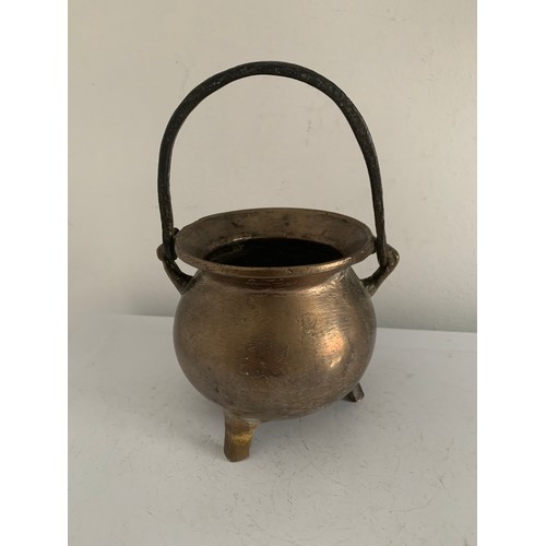 126 - 17thC Bronze Cauldron With Later Additions Having Swing Handle
10 cms diameter x 18 cms h (with hand... 