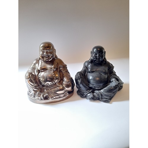 12 - 2 X Buddha Figures one in gold ceramic and the other in black resin. tallest 20cm x 18cm