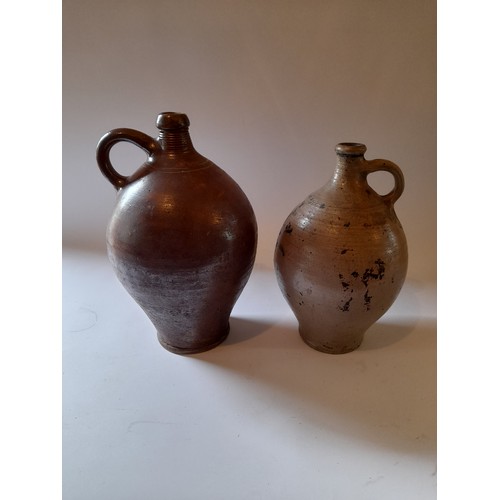 40 - 2 x earthenware jugs, largest 32 cm