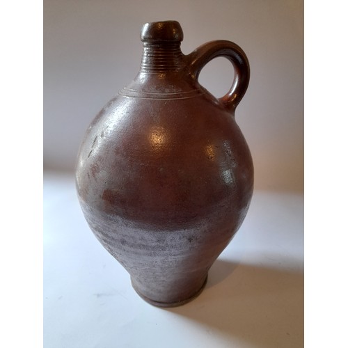 40 - 2 x earthenware jugs, largest 32 cm