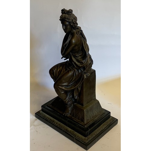 184 - After The Antique Bronze Figure Of A Semi Clad Seated Lady Mounted On A Marble Base. 24 x 16 x 39 cm... 