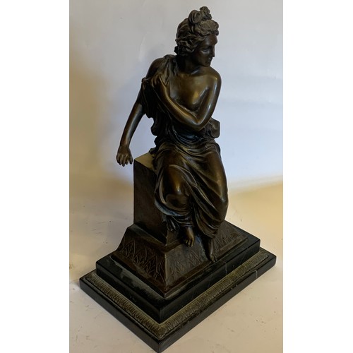 184 - After The Antique Bronze Figure Of A Semi Clad Seated Lady Mounted On A Marble Base. 24 x 16 x 39 cm... 