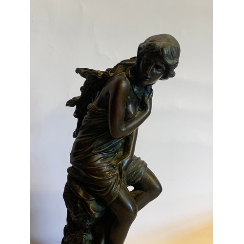 185 - Bronze Figure Of A Seated Semi Clad Lady With Long Hair Stamped To Reverse. 31 cms High