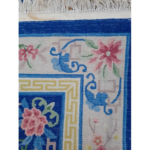 86 - Large Blue Decorative Hand Tied Ground Rug. 290 x 186 cms