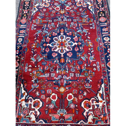 91 - Decorative Hand Made Rug 226 x 136 cms