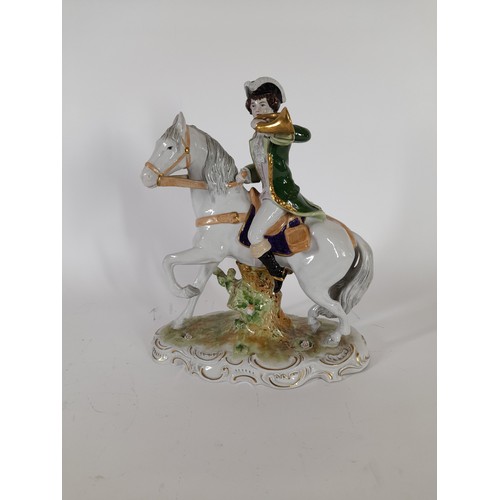 52 - continental ceramic figure of a horseman on horseback,29cm x 25cm