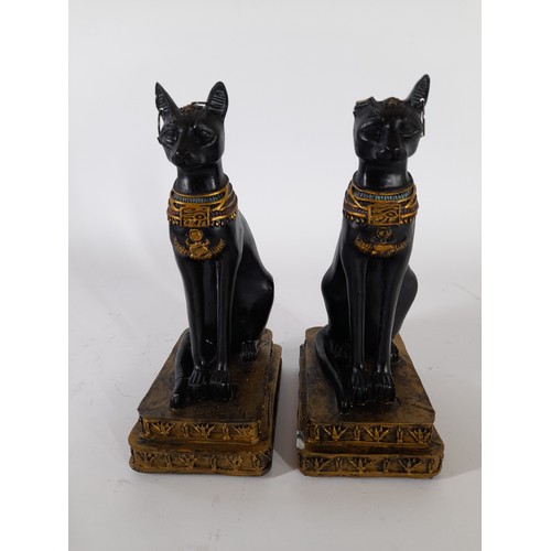 58 - A pair of Egyption Cat Goddess resin figures, 18cm high