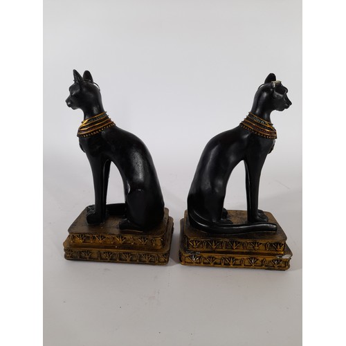 58 - A pair of Egyption Cat Goddess resin figures, 18cm high