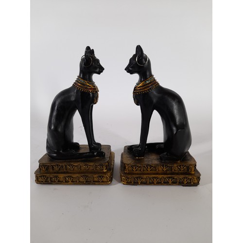 58 - A pair of Egyption Cat Goddess resin figures, 18cm high