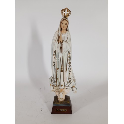 92 - Ceramic Religious figure standing 38cm high