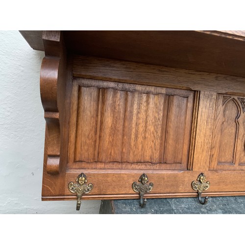 53 - Antique French Coat Hook Shelf With Cherub Hook Decoration And A Central Lozenge. 126 x 23 x 38 cms