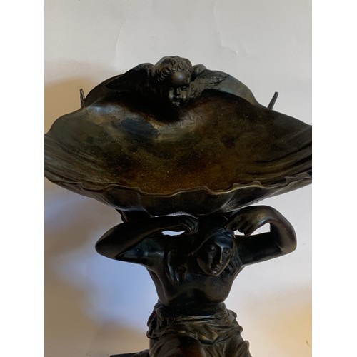 220 - Bronze Figure Of A kneeling Woman Holding A Shell Above With A Cherub Onlooking. 23 x 22 x 28 cms