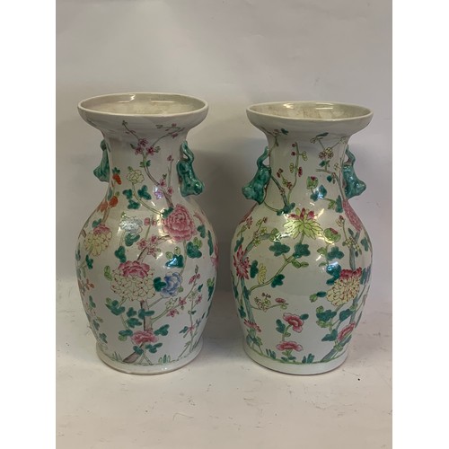 295 - Pair Of Hand Painted Chinese Vases. 35 cms High(2)