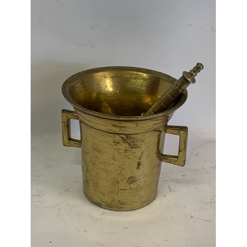 304 - Large Antique Brass Pestle And Mortar. 15 x 14 cms