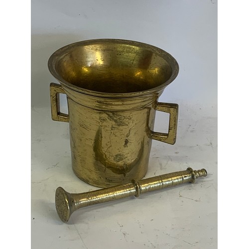 304 - Large Antique Brass Pestle And Mortar. 15 x 14 cms