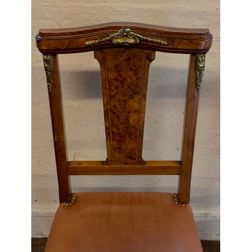 73 - French Walnut Veneer Art Deco Style Table And Six Chairs With Gilt Metal Adornments.