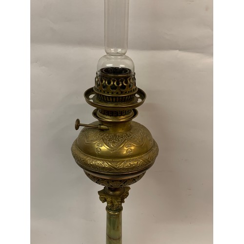 343 - Vintage Oil Burning Lamp With Onyx Base Along With Gilt Decorative Feet. 85 cms High