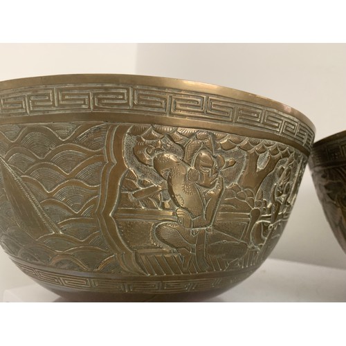 112 - Pair Of Large Oriental Vintage Bronze Charger Or Singing Bowls With Engraved Designs
25 cms diameter... 