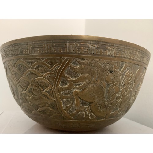 112 - Pair Of Large Oriental Vintage Bronze Charger Or Singing Bowls With Engraved Designs
25 cms diameter... 