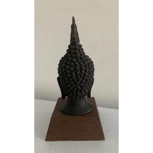 146 - Bronze Buddha Head Statue (base not included)
15 cms h