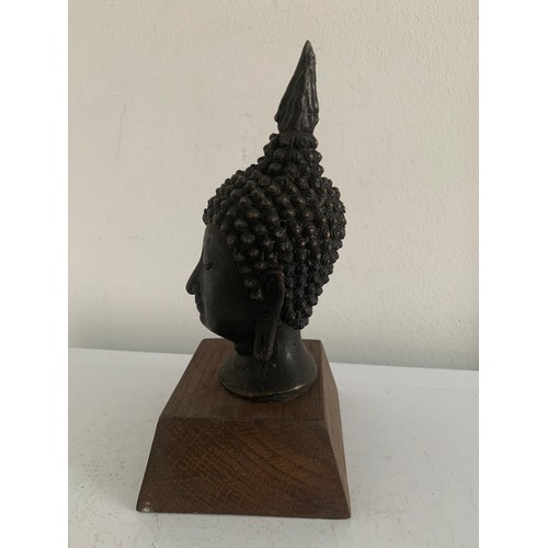 146 - Bronze Buddha Head Statue (base not included)
15 cms h