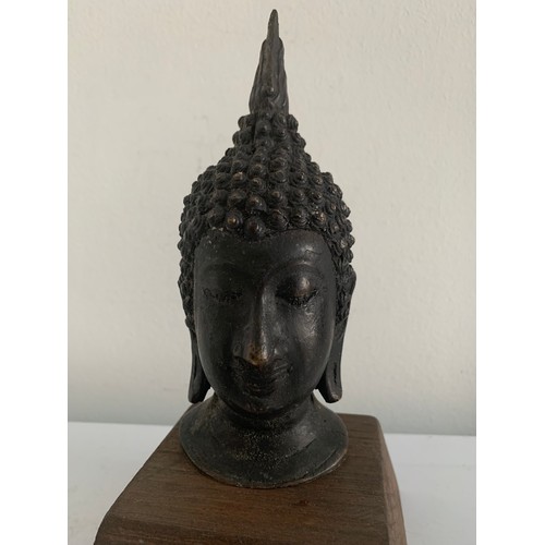 146 - Bronze Buddha Head Statue (base not included)
15 cms h