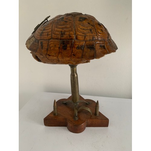 142 - Unusual Trench Art Lamp Having A Triangular Wooden Base And A Tortoiseshell Shade With Military Badg... 