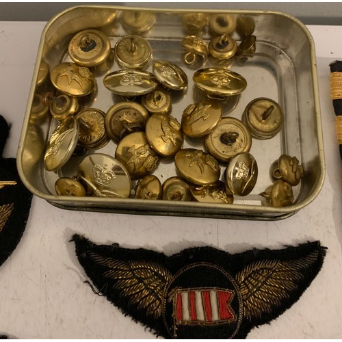 121 - A Collection Of Military Cloth Badges Predominately RAF Together With A Tin Of Military Buttons