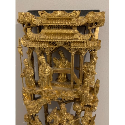 130 - Carved Chinese Wooden Gilt Pierced Plaque Of An Oriental Court Scene 
15 x 5 x 44 cms h