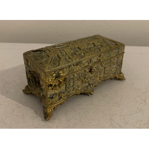 132 - Vintage Brass Casket Style Jewellery Box Together With Similar Trinket Box
9 x 4.5 x 4.5 cms h and 9... 