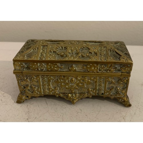 132 - Vintage Brass Casket Style Jewellery Box Together With Similar Trinket Box
9 x 4.5 x 4.5 cms h and 9... 