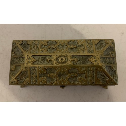 132 - Vintage Brass Casket Style Jewellery Box Together With Similar Trinket Box
9 x 4.5 x 4.5 cms h and 9... 