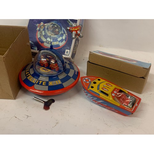 397 - Boxed Wind Up Tin Plate Toy Space Ship X-11 Along With A Tin Plate Candle Power Boat (2)