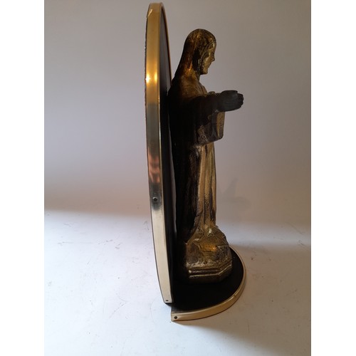 259 - Brass coloured spelter Sacred Heart with open arm on wooden plinth,  33cm x 23cm