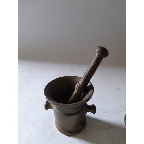 274 - 2 x Bronze Pestle and Mortars largest 7.5cm high