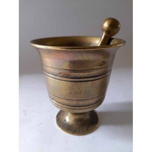 276 - Bronze Pestle and Mortar 12cm high