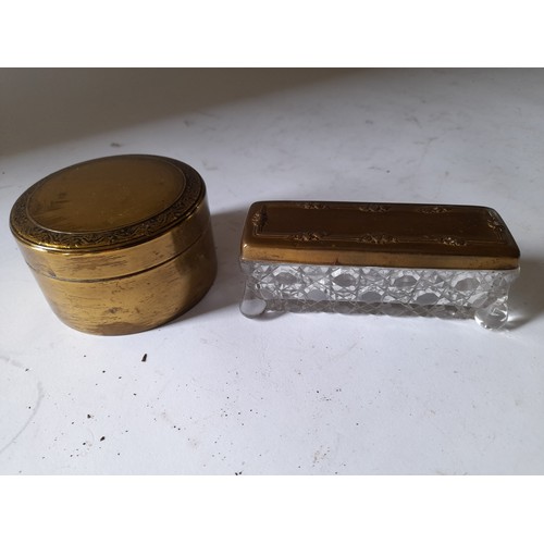 277 - 1 x round Brass box 8cm dia and a glass pin box with Brass lid 10cm long (2)