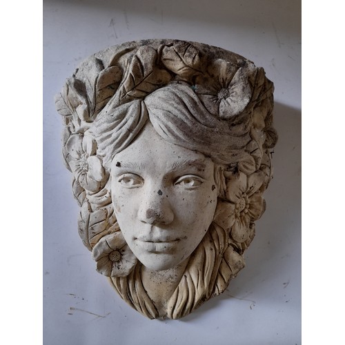 283 - Moulded concrete wall planter in the form of a female head, 33cm high x 30cm wide