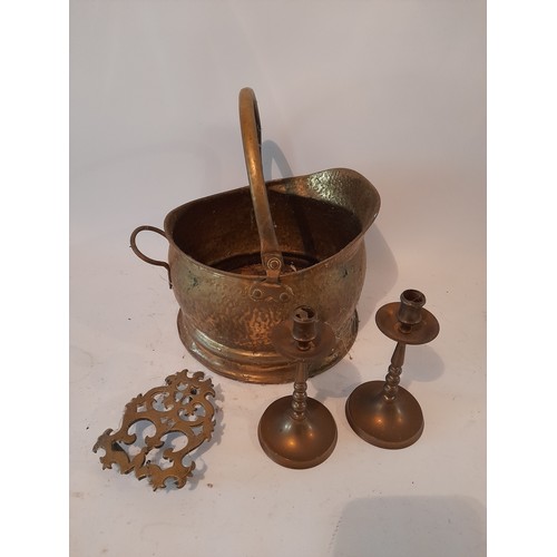 298 - Small Brass Trivet, Pair brass candlesticks 19cm high and small coal scuttle