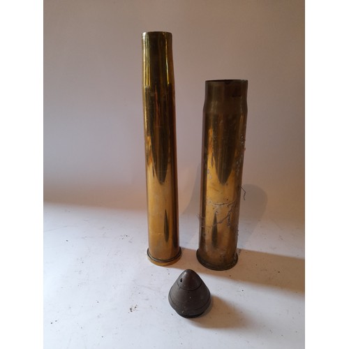 300 - 2 X Brass shell cases and a Deactivated nose fuse