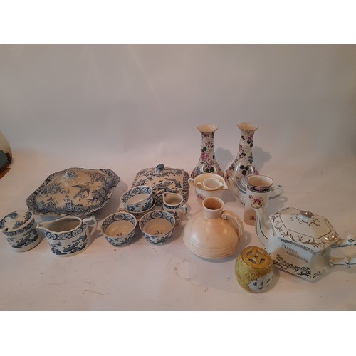 303 - A collection of ceramic items to include blue and white and a Crown Ducal Waxy Glaze jug number 259.